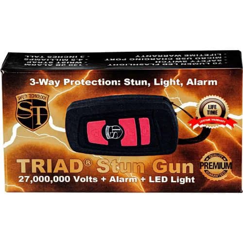 Triad stun gun box with 27M volts, alarm, LED light features, and lifetime warranty logo.